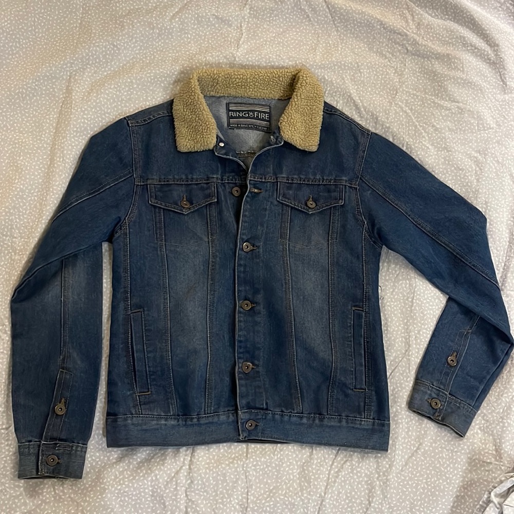 A jean jacket never worn cute but does fit me.